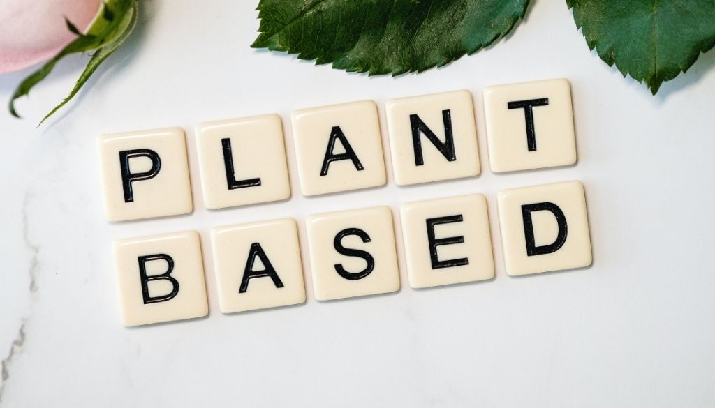 Plant-based diet lowering cholesterol letters.