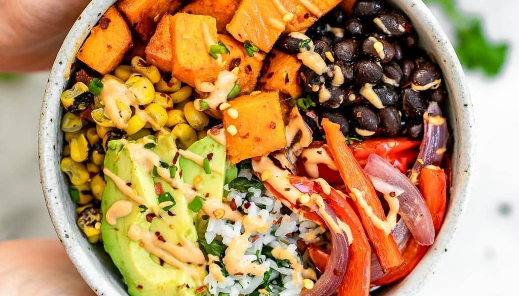 Vegan sweet potato and black bean burrito bowl recipe.